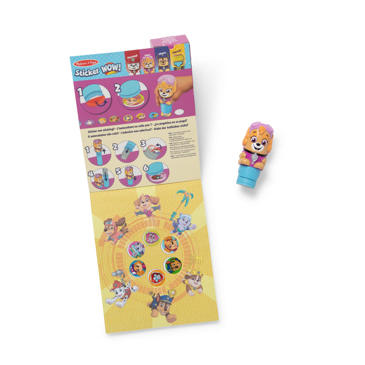 The loose pieces of The Melissa & Doug Sticker WOW!™ 24-Page Activity Pad and Sticker Stamper, 300 Stickers, Arts and Crafts Fidget Toy Collectible Character – PAW Patrol Skye