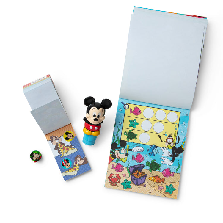 The loose pieces of The Melissa & Doug Sticker WOW!™ Disney Mickey Mouse Bundle: 24-Page Activity Pad, Sticker Stamper, 500 Stickers, Mini Pad, Arts and Crafts Fidget Toy Collectible Character