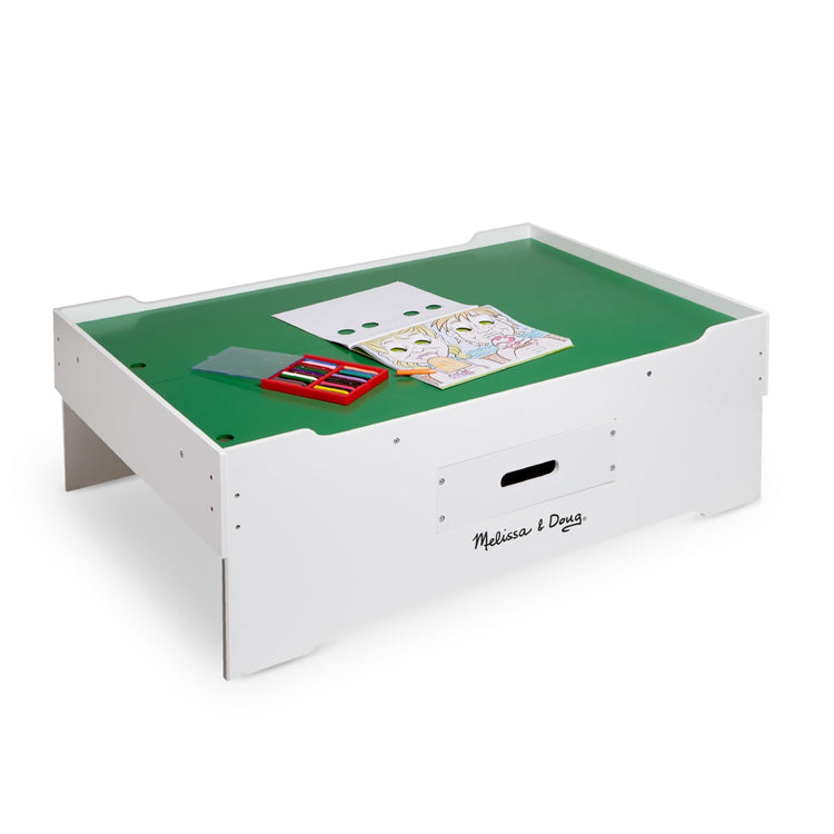 An assembled or decorated the Melissa & Doug Deluxe Wooden Multi-Activity Play Table - For Trains, Puzzles, Games, More