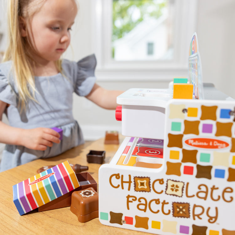 Melissa & Doug Toy Spotlight Wooden Chocolate Factory Play Set blog post