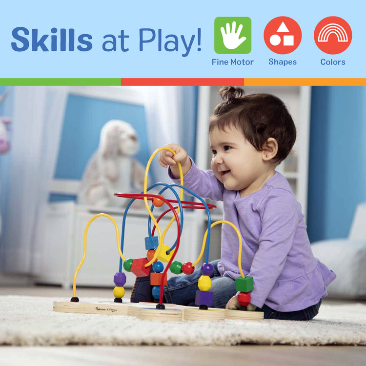 A kid playing with The Melissa & Doug Classic Bead Maze - Wooden Educational Toy