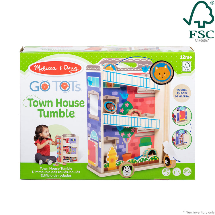 The front of the box for The Melissa & Doug GO Tots Wooden Town House Tumble with 6 Disks