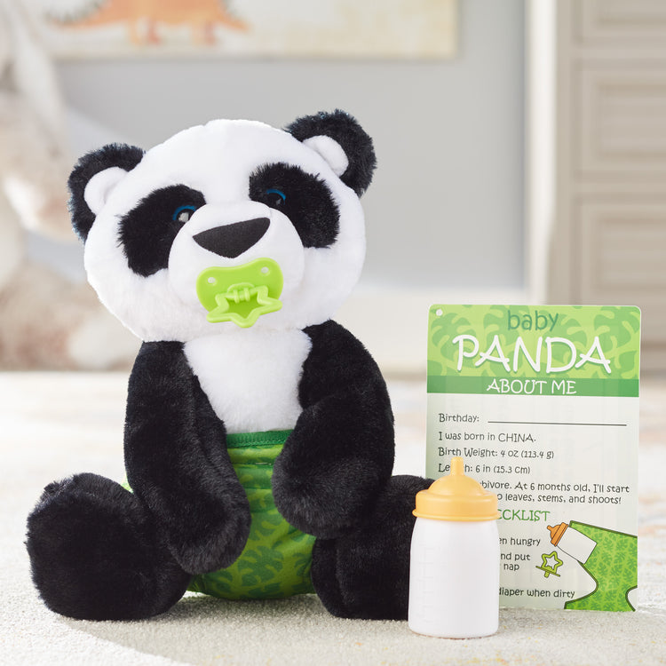 A playroom scene with The Melissa & Doug 11-Inch Baby Panda Plush Stuffed Animal with Pacifier, Diaper, Baby Bottle