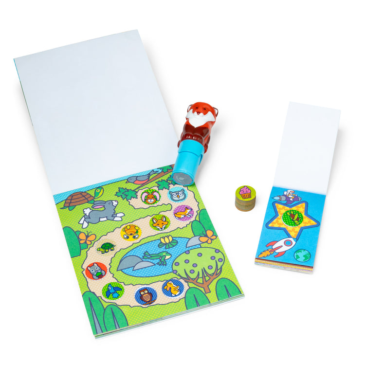 An assembled or decorated The Melissa & Doug Sticker WOW!™ Fox Bundle: 24-Page Activity Pad, Sticker Stamper, 500 Stickers, Arts and Crafts Fidget Toy Collectible Character