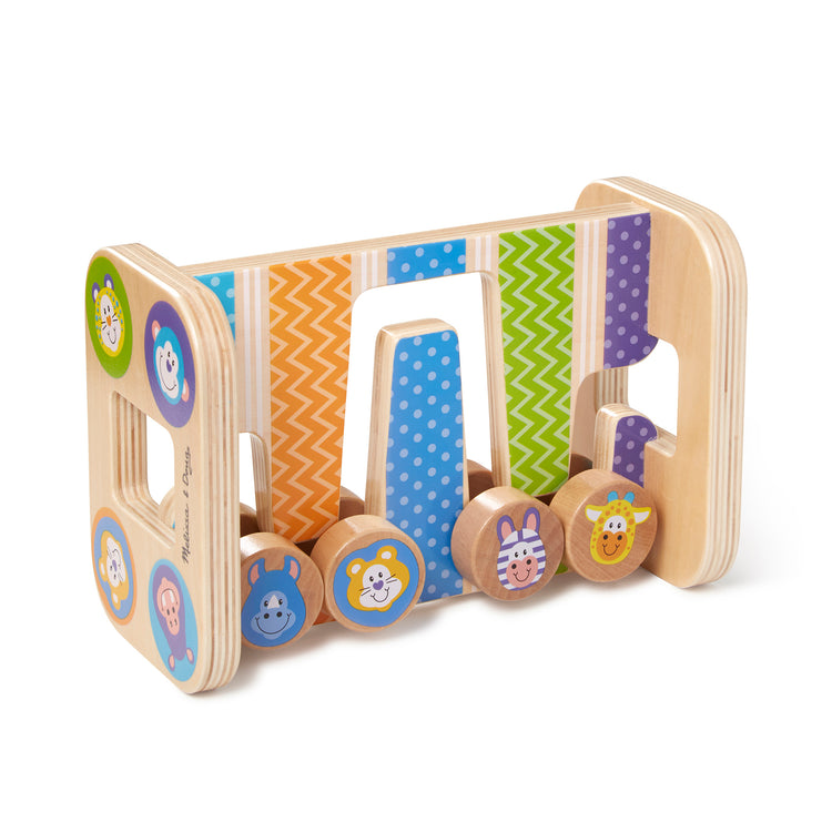 An assembled or decorated The Melissa & Doug First Play Wooden Safari Zig-Zag Tower With 4 Rolling Pieces