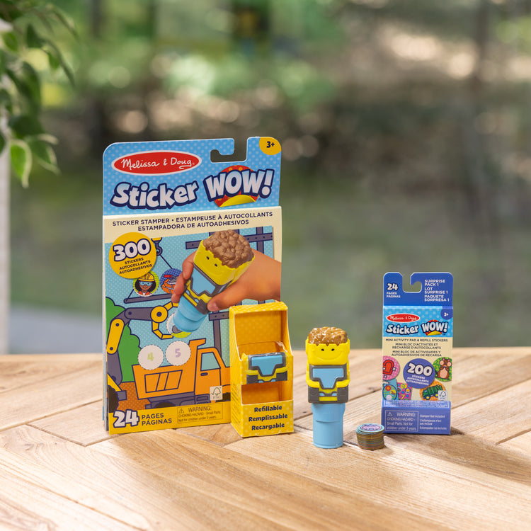 A playroom scene with The Melissa & Doug Sticker WOW!™ Bulldozer Bundle: 24-Page Activity Pad, Sticker Stamper, 500 Stickers, Arts and Crafts Fidget Toy Collectible Character