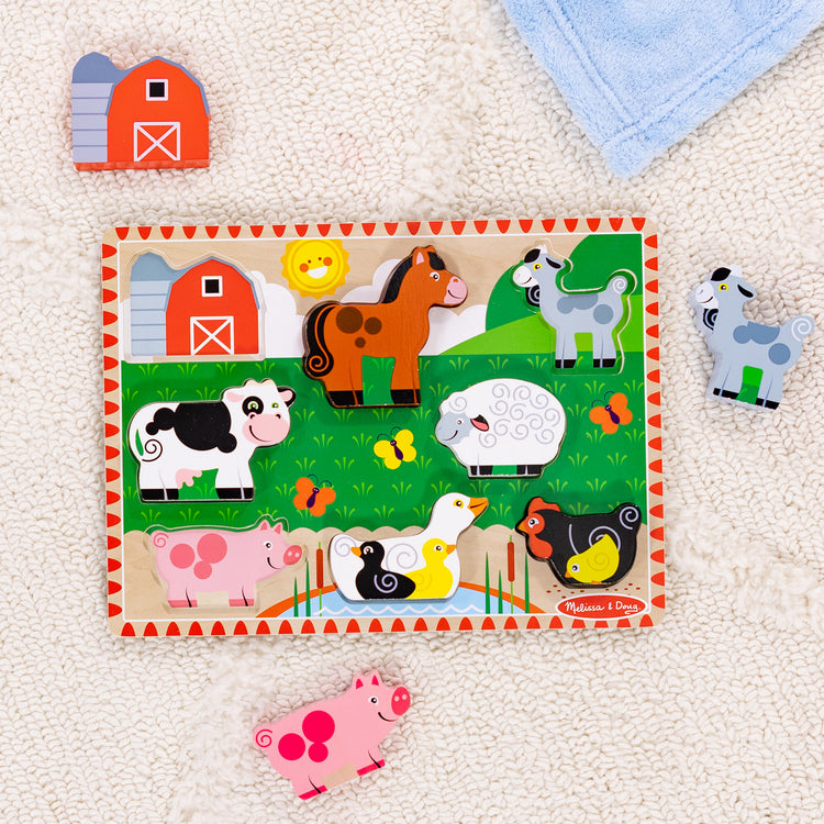 A playroom scene with The Melissa & Doug Farm Wooden Chunky Puzzle (8 pcs)