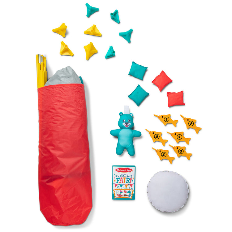 The loose pieces of The Melissa & Doug Fun at the Fair! Game Center Play Tent – 4 Sides of Activities