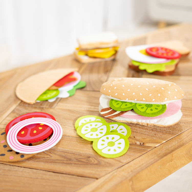 A playroom scene with The Melissa & Doug Felt Food Sandwich Play Food Set (33 pcs)