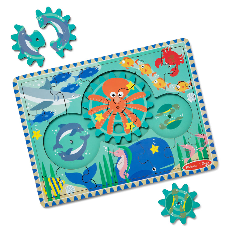 The loose pieces of The Melissa & Doug Wooden Underwater Jigsaw Spinning Gear Puzzle – 18 Pieces