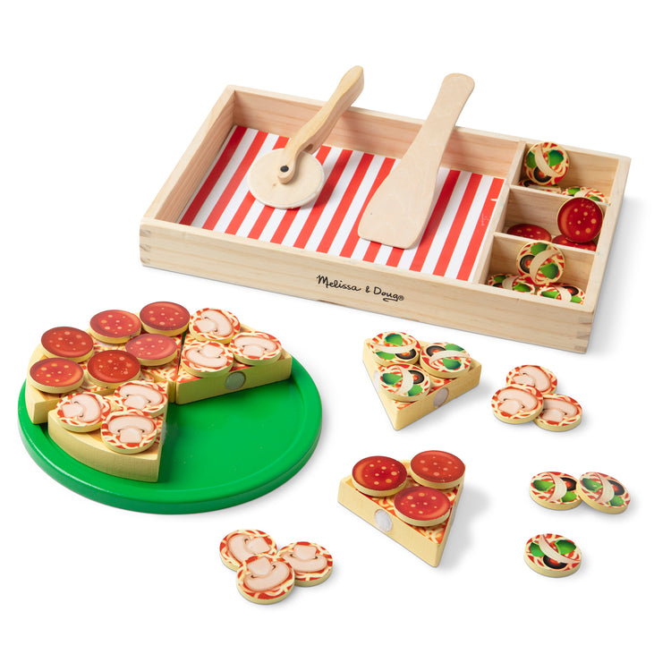 The loose pieces of The Melissa & Doug Wooden Pizza Party Play Food Set With 36 Toppings