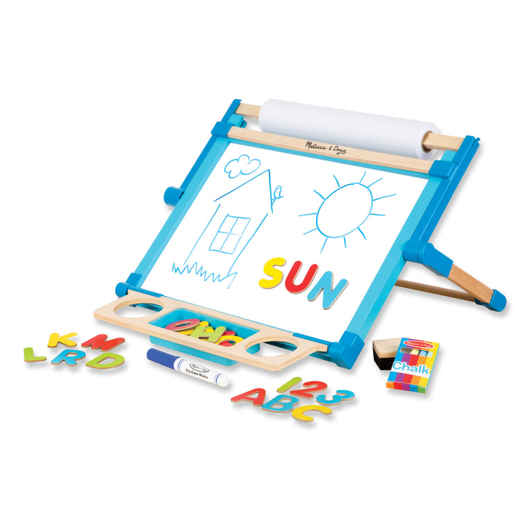 The loose pieces of The Melissa & Doug Double-Sided Magnetic Tabletop Art Easel - Dry-Erase Board and Chalkboard