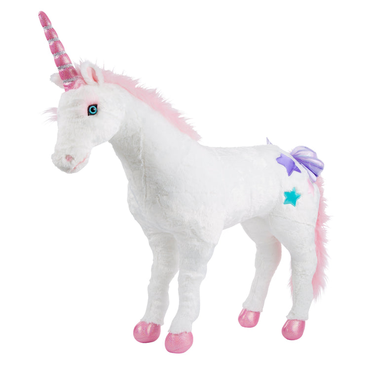 The loose pieces of The Melissa & Doug Giant Unicorn - Lifelike Plush Stuffed Animal (over 2 feet tall)