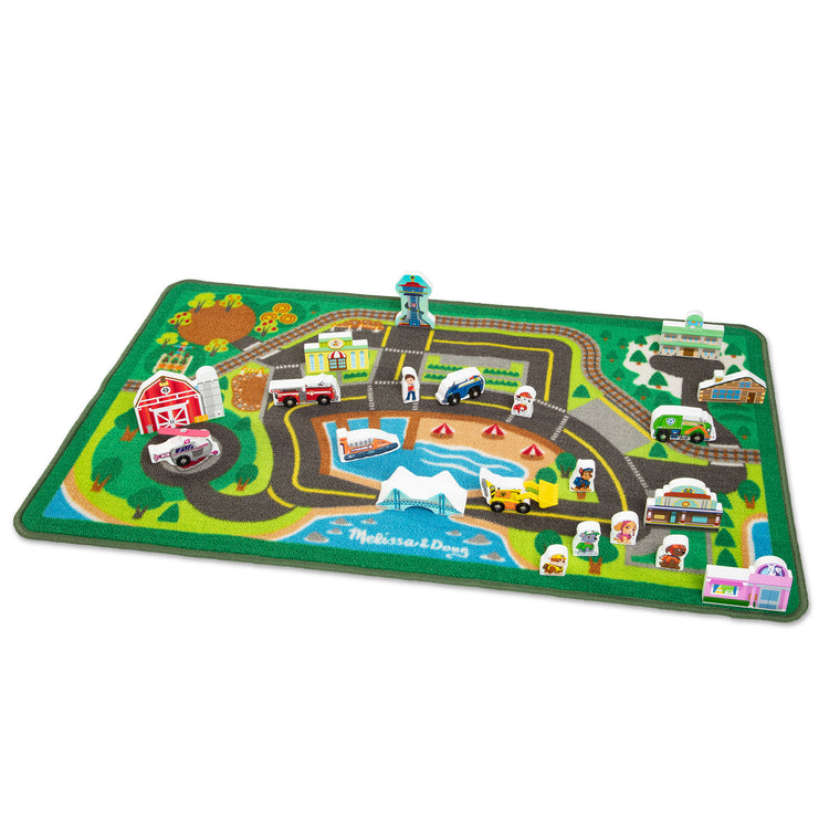 The loose pieces of The Melissa & Doug PAW Patrol Activity Rug - Adventure Bay (22 Pieces)