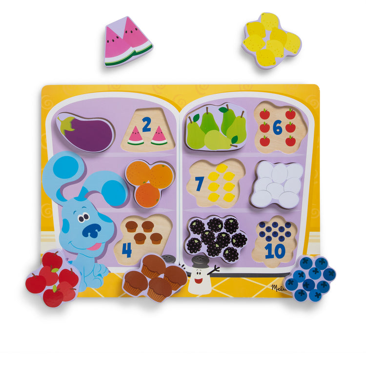 The loose pieces of The Melissa & Doug Blue's Clues & You! Wooden Chunky Puzzle - Fridge Food (10 Pieces)