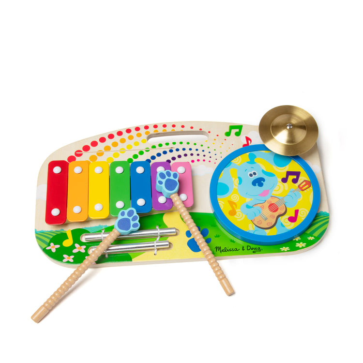 The loose pieces of The Melissa & Doug Blue's Clues & You! Wooden Music Maker Board (5 Instruments)