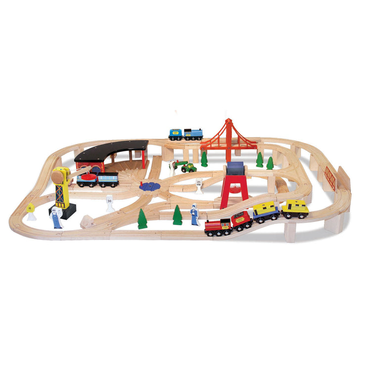 The loose pieces of The Melissa & Doug Deluxe Wooden Railway Train Set (130+ pcs)