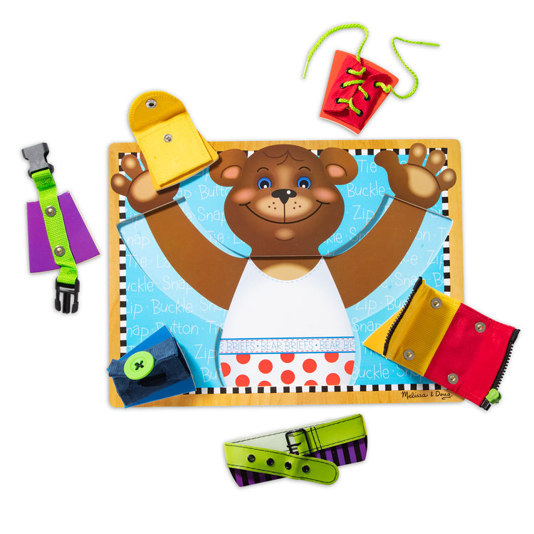 The loose pieces of The Melissa & Doug Basic Skills Puzzle Board - Wooden Educational Toy