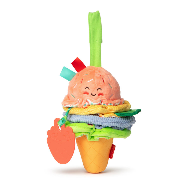 The loose pieces of The Melissa & Doug Ice Cream Take-Along Clip-On Infant Toy with Sound and Vibration