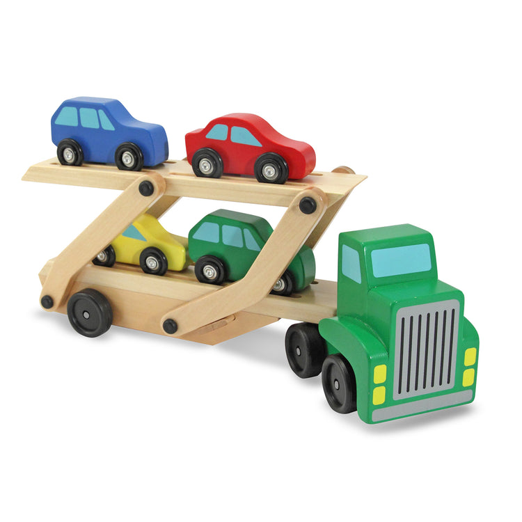 The loose pieces of The Melissa & Doug Car Carrier Truck and Cars Wooden Toy Set With 1 Truck and 4 Cars