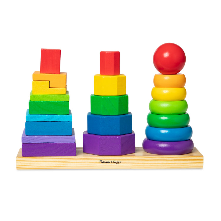 The loose pieces of The Melissa & Doug Geometric Stacker - Wooden Educational Toy