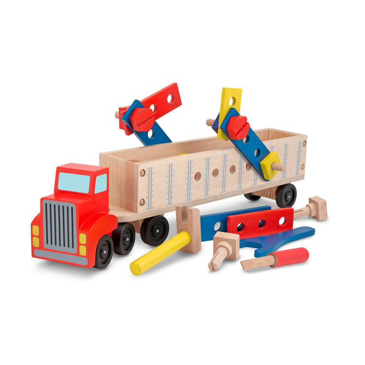 The loose pieces of The Melissa & Doug Wooden Big Rig Truck Building Set (22 pcs)