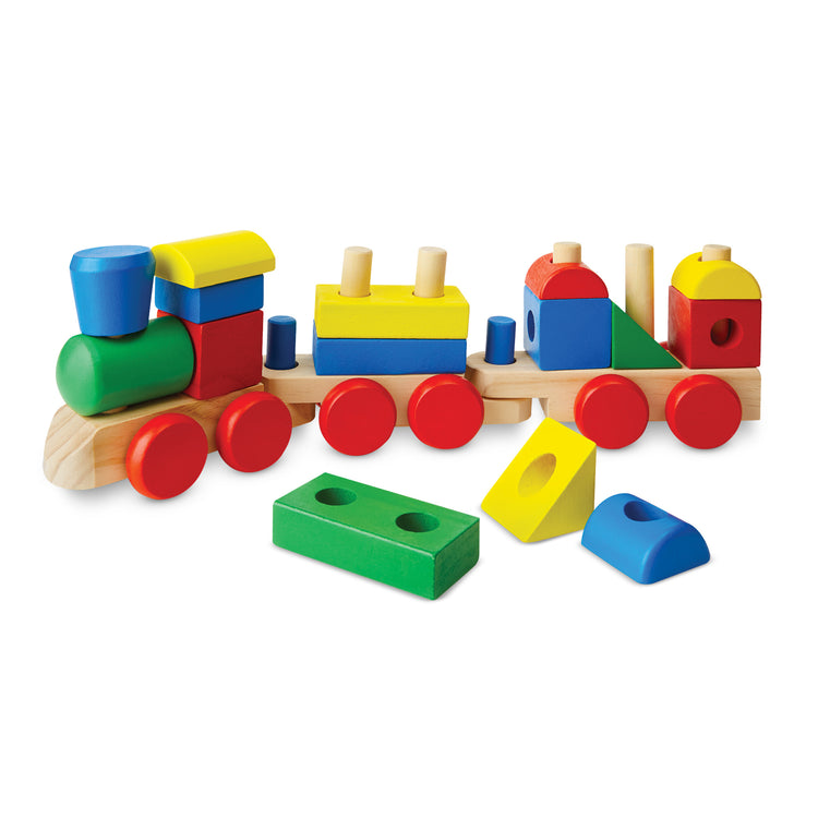 The loose pieces of The Melissa & Doug Wooden Stacking Train Learning Toy Vehicle With 18 Connecting Pcs