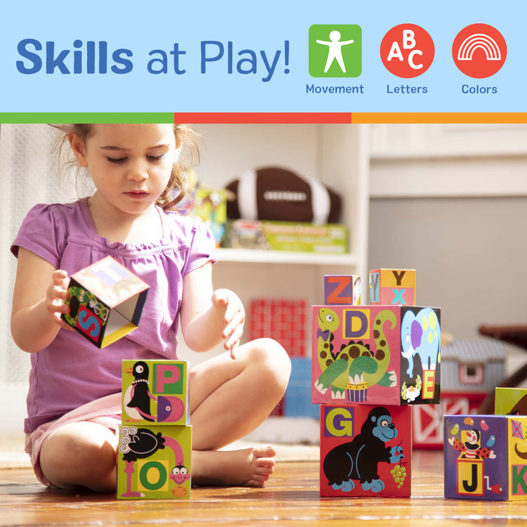 A kid playing with The Melissa & Doug Deluxe 10-Piece Alphabet Nesting and Stacking Blocks