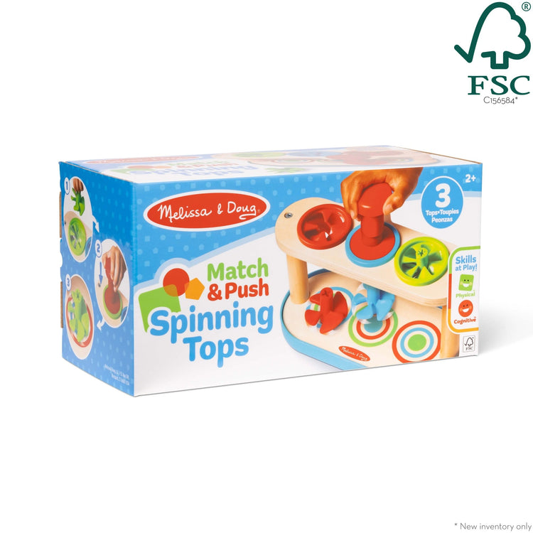 The front of the box for The Melissa & Doug Match & Push Spinning Tops Developmental Skills Toy for Girls and Boys 2+ 