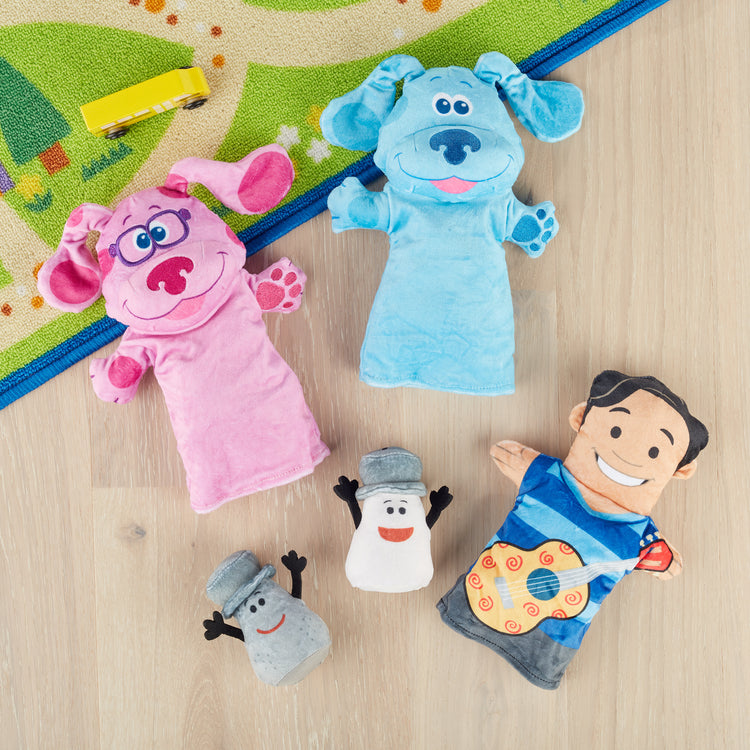 A playroom scene with The Melissa & Doug Blue's Clues & You! Hand & Finger Puppets (5 Pieces)