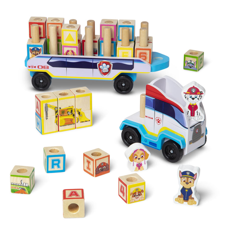 The loose pieces of The Melissa & Doug PAW Patrol Wooden ABC Block Truck (33 Pieces)