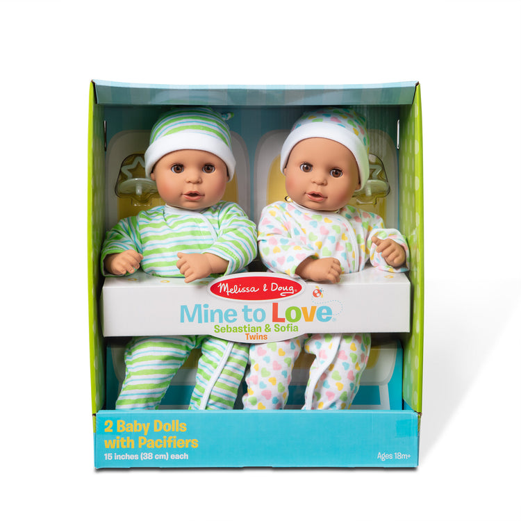 The front of the box for The Melissa & Doug Mine to Love Twins Sebastian & Sofia 15” Medium Skin-Tone Boy and Girl Baby Dolls with Rompers, Caps, Pacifiers