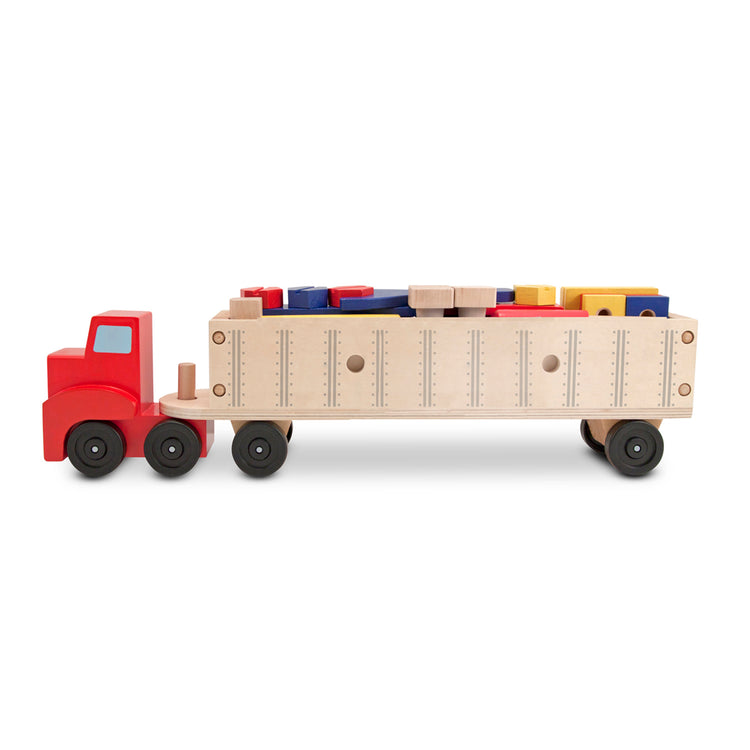 An assembled or decorated The Melissa & Doug Wooden Big Rig Truck Building Set (22 pcs)