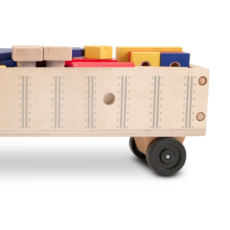 An assembled or decorated The Melissa & Doug Wooden Big Rig Truck Building Set (22 pcs)