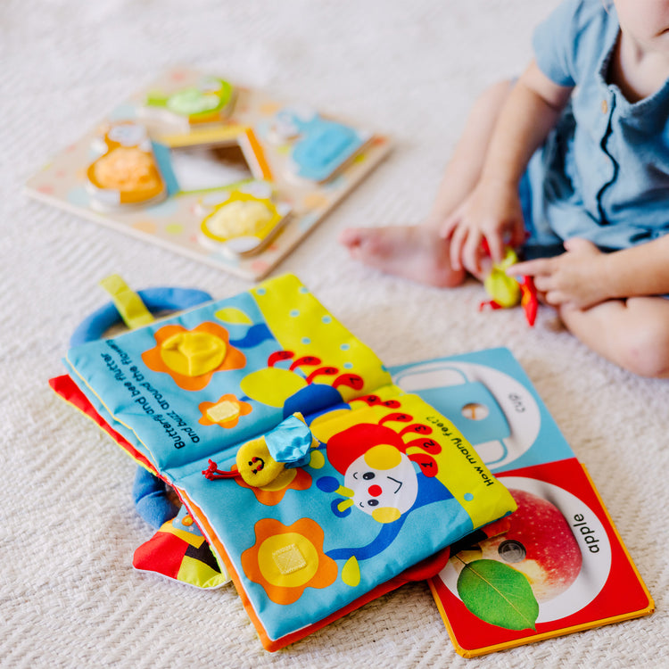 A kid playing with The My First" Collection Gift Set