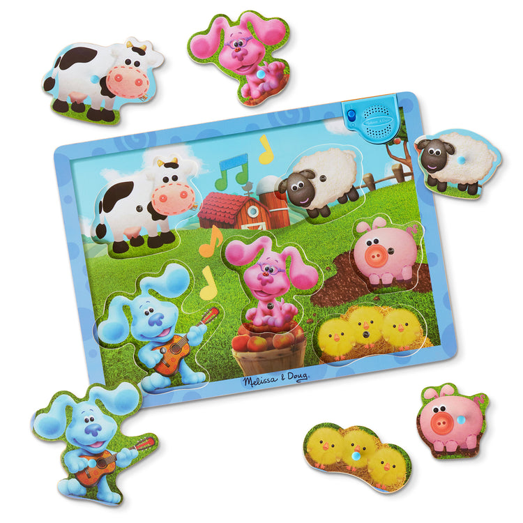 The loose pieces of The Melissa & Doug Blue's Clues & You! Wooden Sound Puzzle - Musical Farm (6 Pieces)