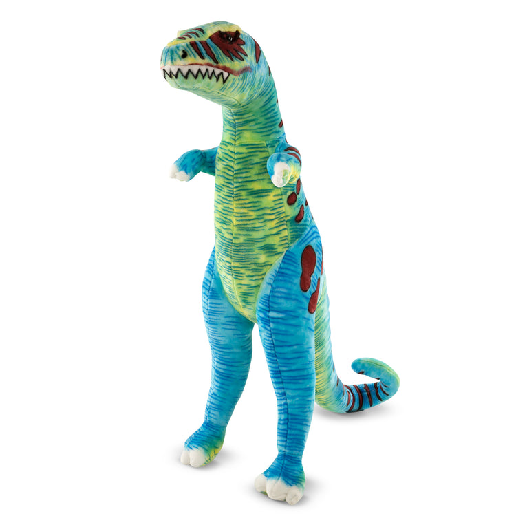 The loose pieces of The Melissa & Doug Standing T-Rex Giant Lifelike Plush Stuffed Animal