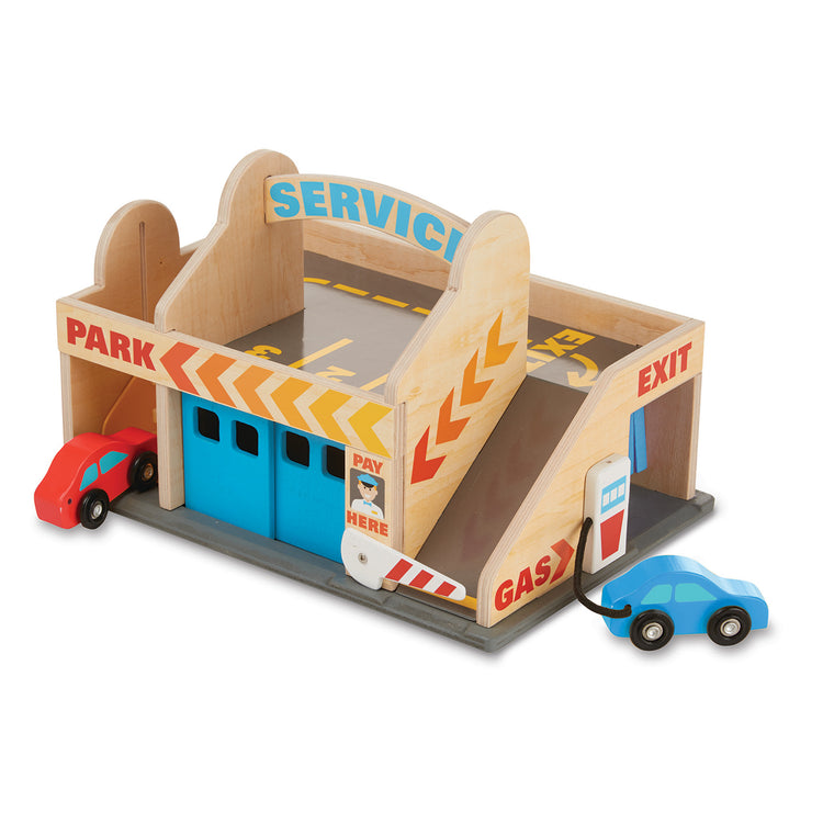 The loose pieces of The Melissa & Doug Service Station Parking Garage With 2 Wooden Cars and Drive-Thru Car Wash