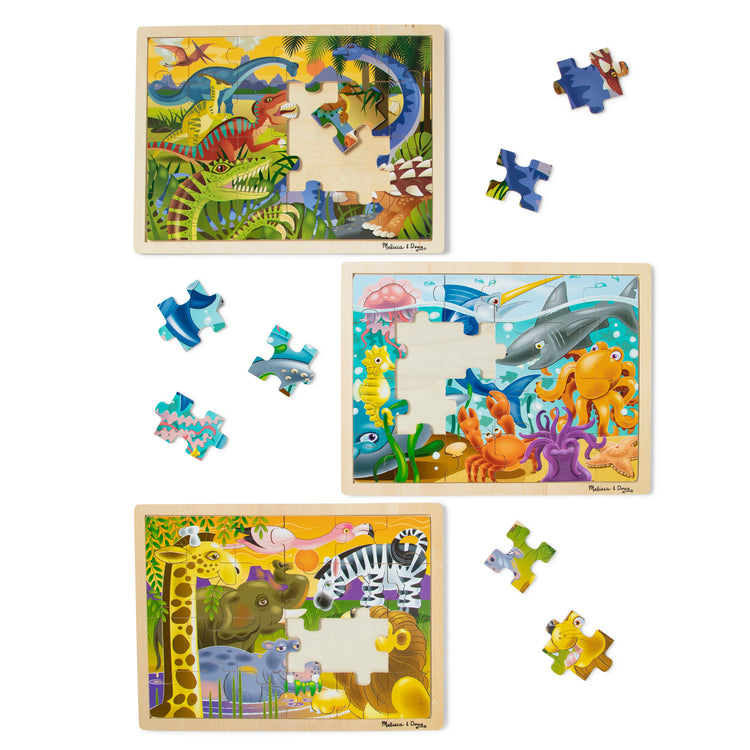 The loose pieces of The Melissa & Doug Jigsaw Puzzle Bundle (Dinosaur,Safari and Ocean)