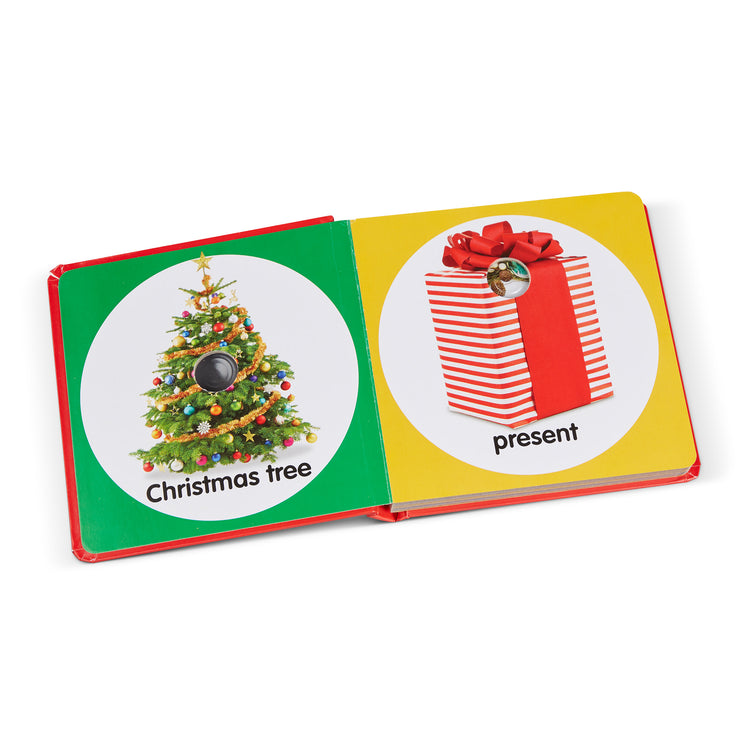 The loose pieces of The Melissa & Doug Children’s Book – Poke-a-Dot: Christmas (Board Book with Buttons to Pop)