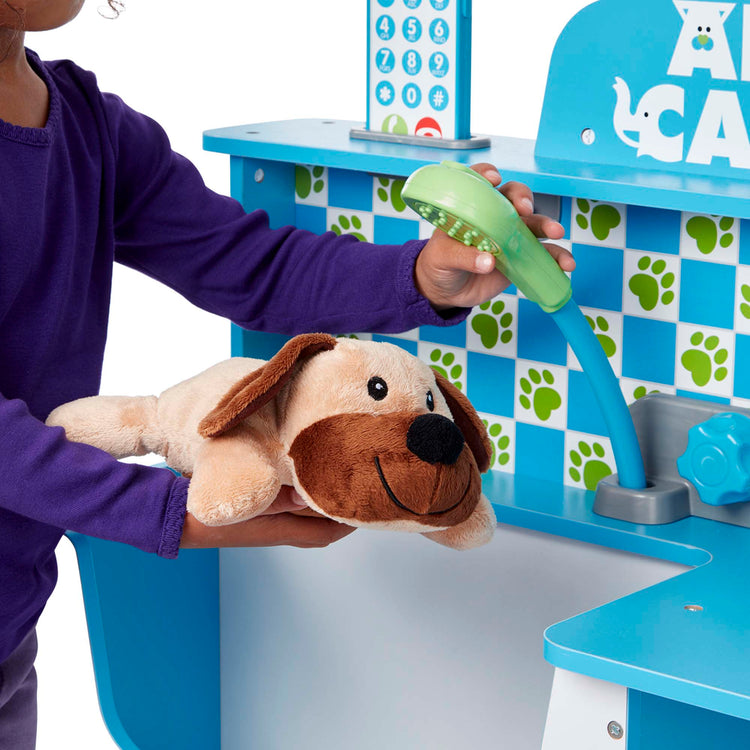  The Melissa & Doug Animal Care Veterinarian and Groomer Wooden Activity Center for Plush Stuffed Pets (Not Included)