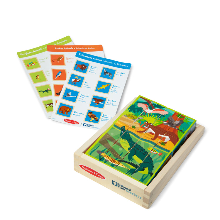 The loose pieces of The Melissa & Doug National Parks Alphabet & Animals 24-Piece Cube Puzzle (Everglades, Arches, Yellowstone)