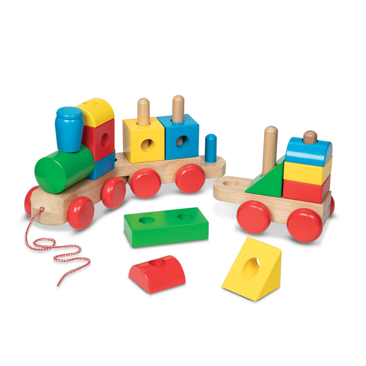 The loose pieces of The Melissa & Doug Wooden Jumbo Stacking Train – 4-Color Classic Wooden Toddler Toy (17 pcs)