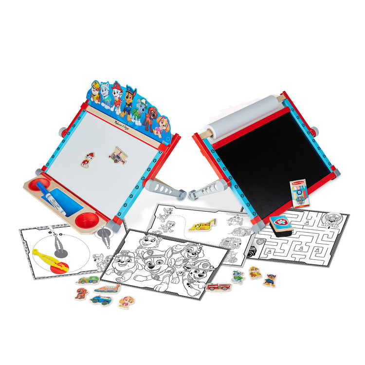 The loose pieces of The Melissa & Doug PAW Patrol Wooden Double-Sided Tabletop Art Center Easel (33 Pieces)