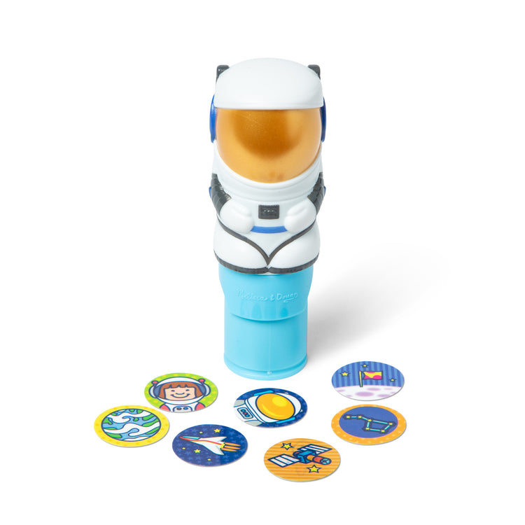 The loose pieces of The Melissa & Doug Sticker WOW!™ Astronaut Bundle: 24-Page Activity Pad, Sticker Stamper, Mini Activity Pad, 500 Stickers, Arts and Crafts Fidget Toy Collectible Character