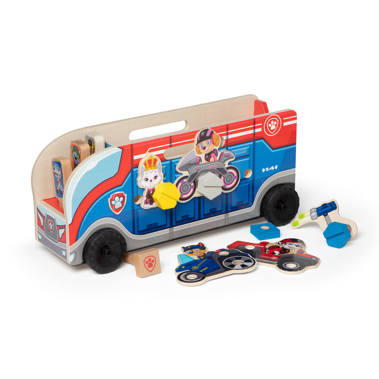 The loose pieces of The Melissa & Doug PAW Patrol Match & Build Mission Cruiser