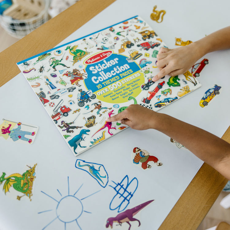 A kid playing with The Melissa & Doug Sticker Collection Book: Dinosaurs, Vehicles, Space, and More - 500+ Stickers