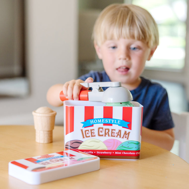 A kid playing with The Melissa & Doug Scoop and Stack Ice Cream Cone Magnetic Pretend Play Set, Multicolor