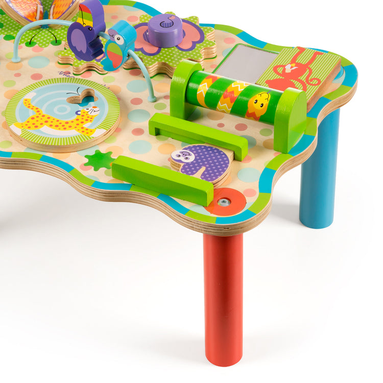 The loose pieces of The Melissa & Doug First Play Children’s Jungle Wooden Activity Table for Toddlers