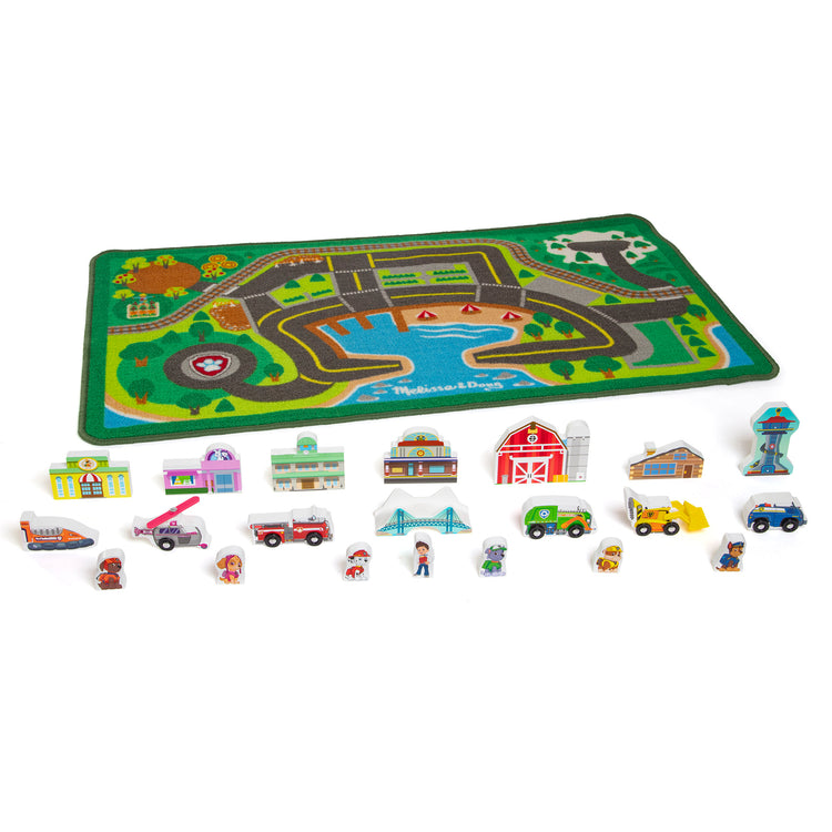 The loose pieces of The Melissa & Doug PAW Patrol Activity Rug - Adventure Bay (22 Pieces)